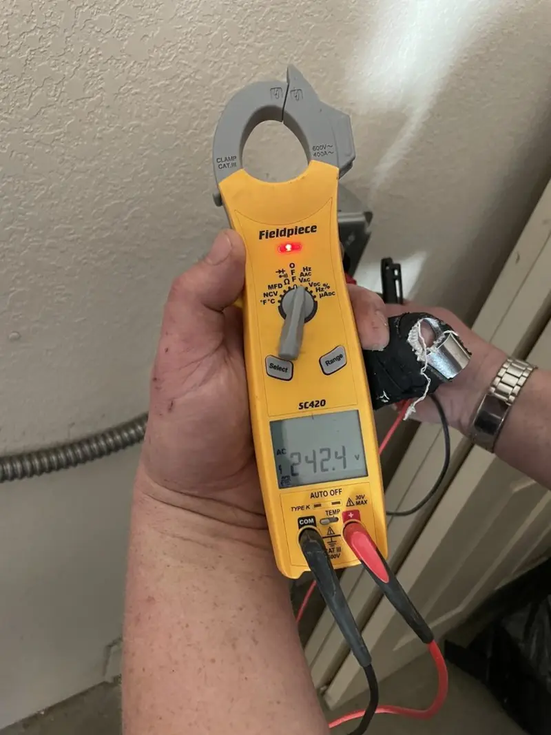 Voltage testing with clamp meter during Aluminum Wiring Replacement in Hattiesburg